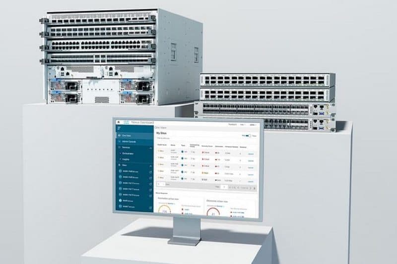 Technician working among server racks